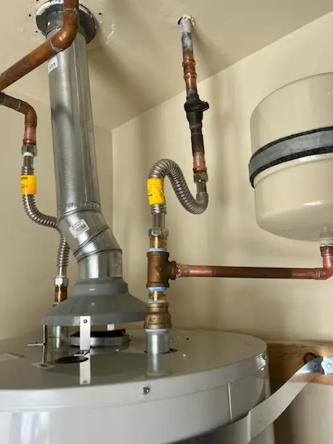 Water heater installation and plumbing repair in Wismer